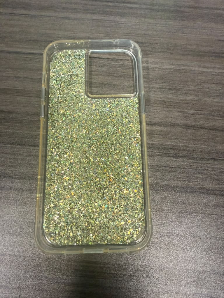 Clear phone case with gold glitter back