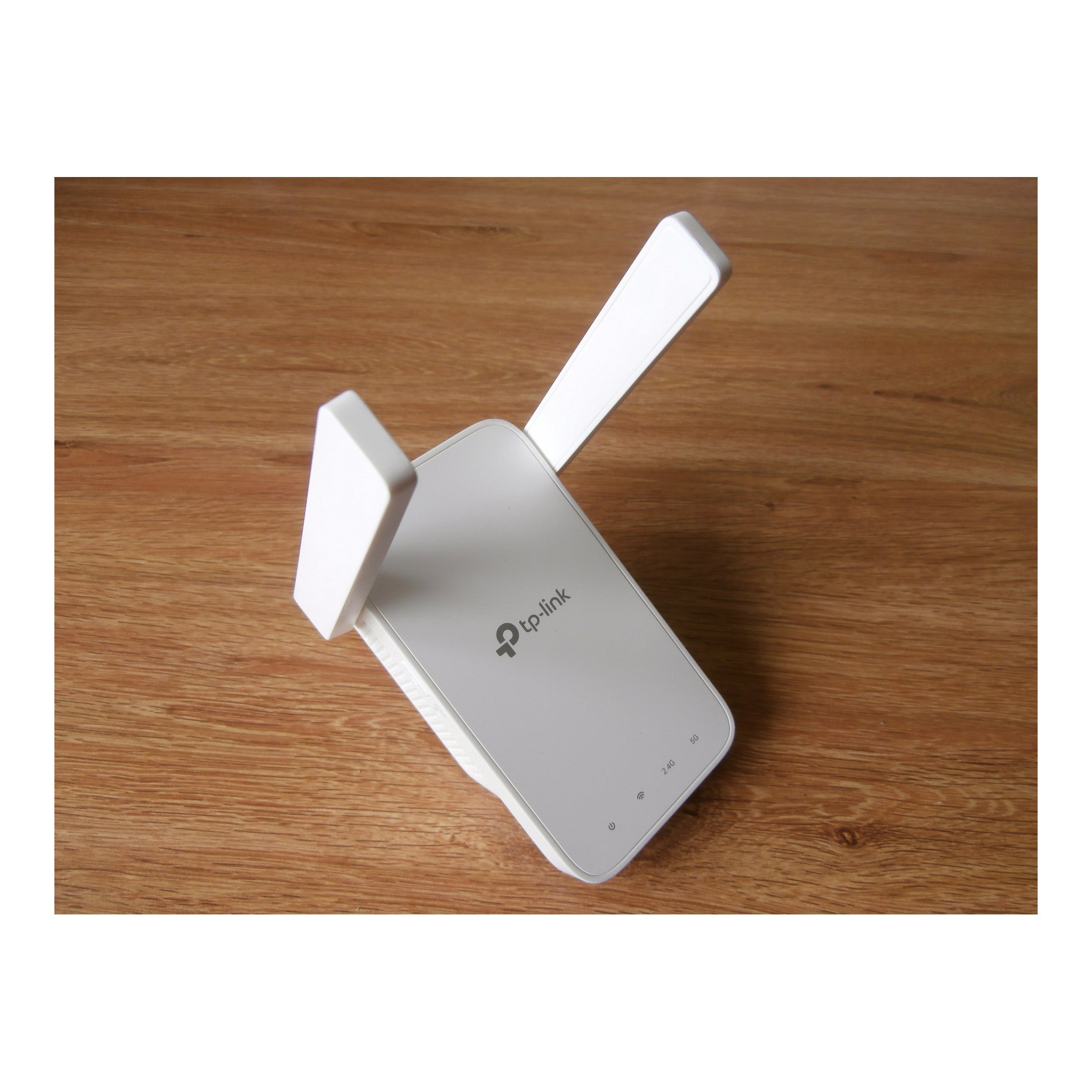 TP-Link AC1200 WiFi Extender, 2025 Wirecutter Best WiFi Extender, 1.2Gbps home signal booster, Dual Band 5GHz/2.4GHz, Up to 1600 Sq.ft and 32 Devices, EasyMesh Compatible, One Ethernet Port (RE315) - image 1